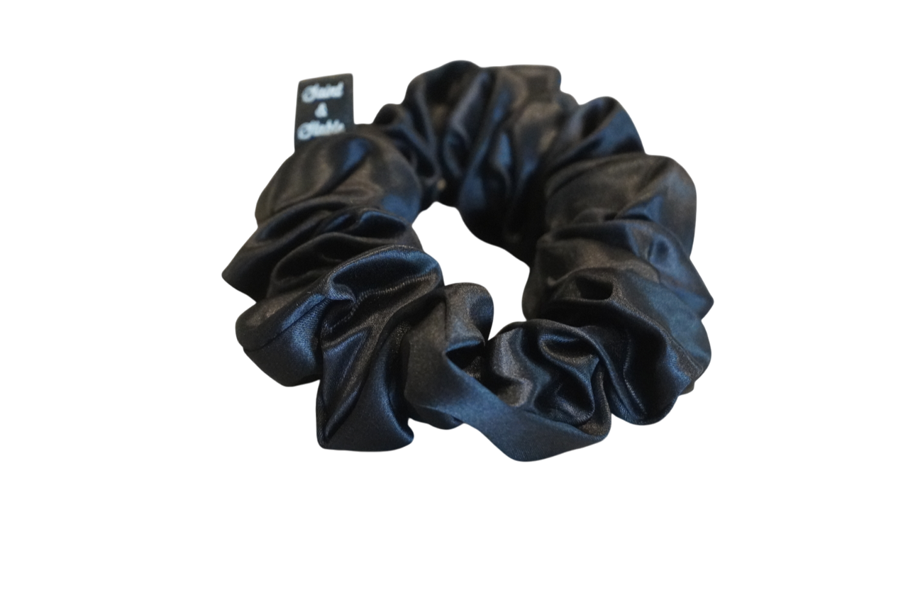 Black satin scrunchie on a white background